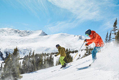 Friends skiing 6 chair chutes in powder at Breckenridge