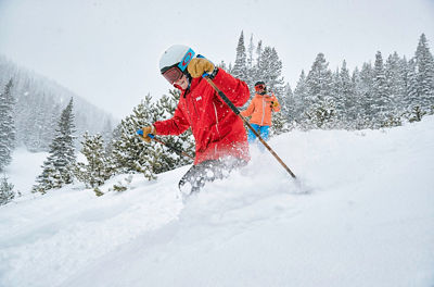 Family skiing and snowboarding at Breckenridge, CO.