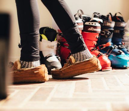 Ski Boots Lined Up at Family Ski Home at Stowe