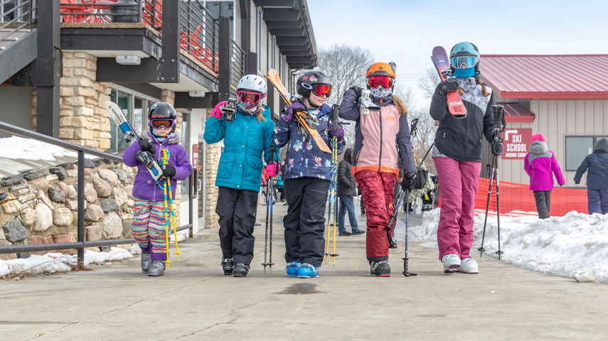 Family and Friends Heading to Ski at Wilmot Mountain