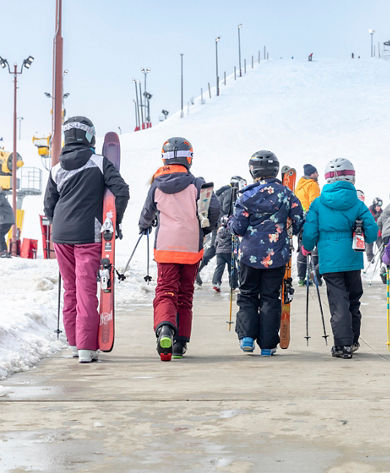 Family and Friends Heading to Ski at Wilmot Mountain