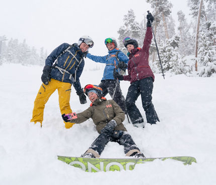 Friends enjoy a powder day on advanced terrain in Keystone, CO.