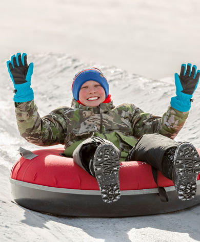 Family enjoys a day of tubing at Wilmot
