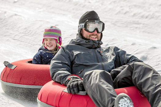 Family enjoys a day of tubing at Wilmot