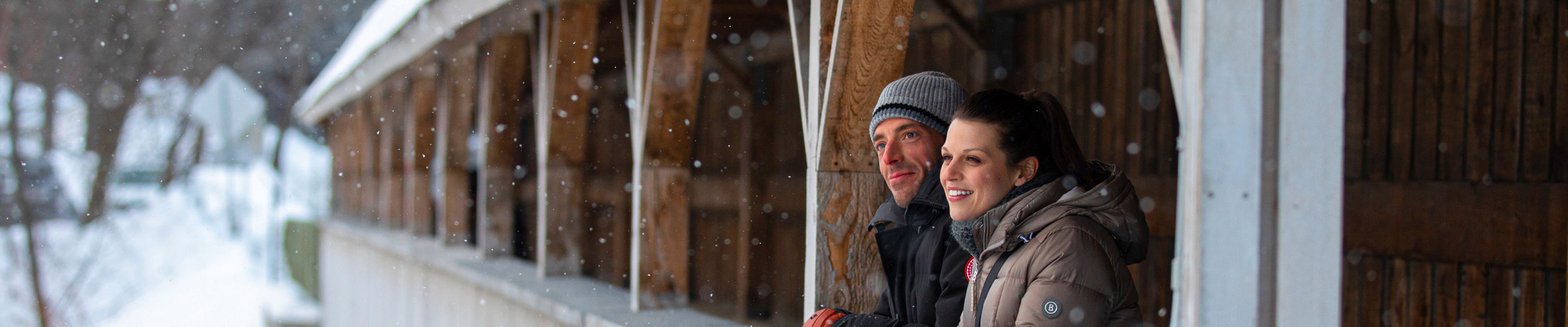 Couple Walking in Stowe Village in Winter at Stowe