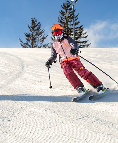Little Girl Skis Downhill at Wilmot Mountain
