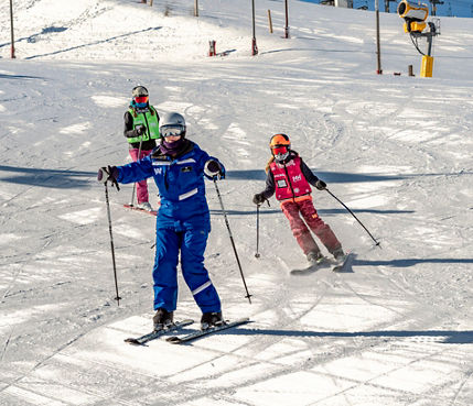 Friends and Family Taking Children's Ski Lessons at Wilmot Mountain