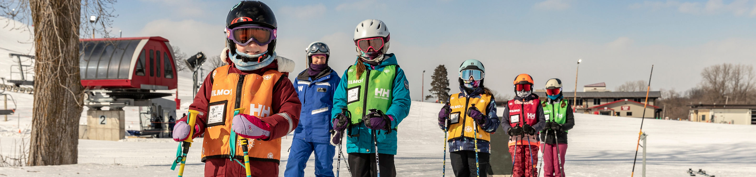 Friends and Family Taking Children's Ski Lessons at Wilmot Mountain