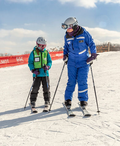 Friends and Family Taking Children's Ski Lessons at Wilmot Mountain