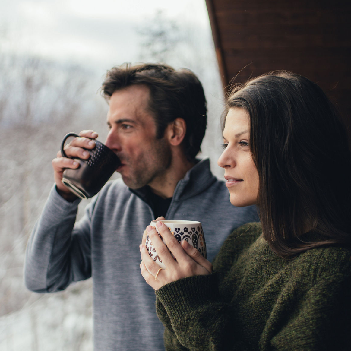 Sipping a hot beverage while looking out the window at Stowe