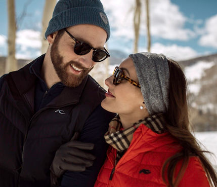 Couple snowshoeing in Beaver Creek, CO