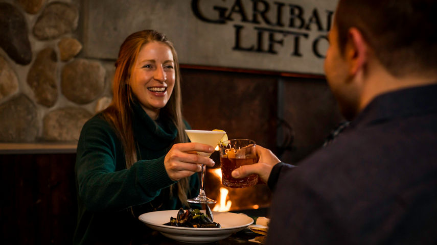 Friends enjoying dinner in Whistler Blackcomb.