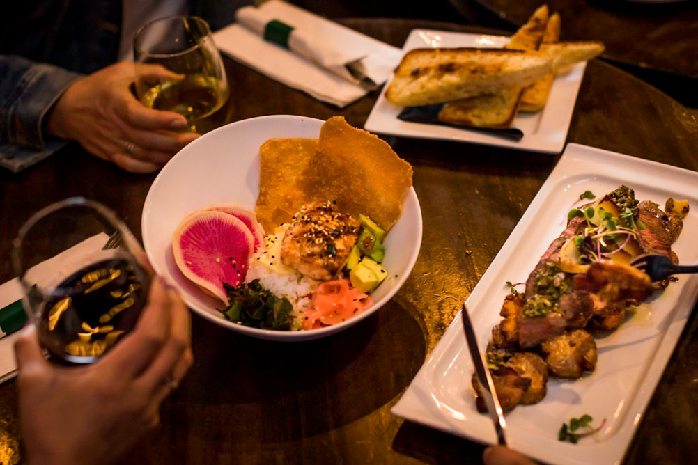Friends enjoying dinner in Whistler Blackcomb.