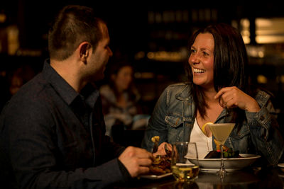 Friends enjoying dinner in Whistler Blackcomb.
