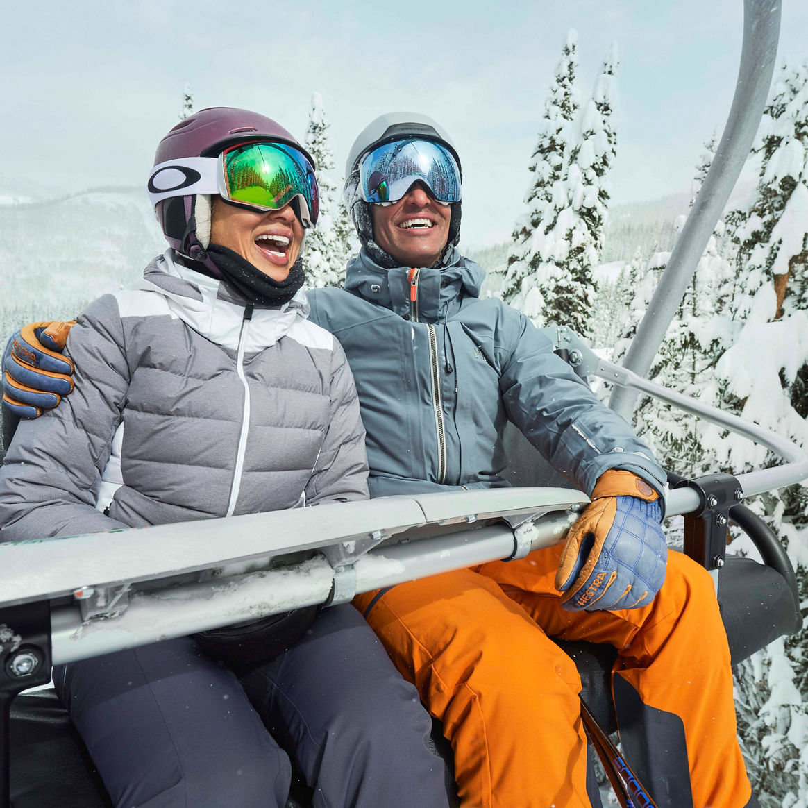 Couple in a chair lift in Vail, CO.