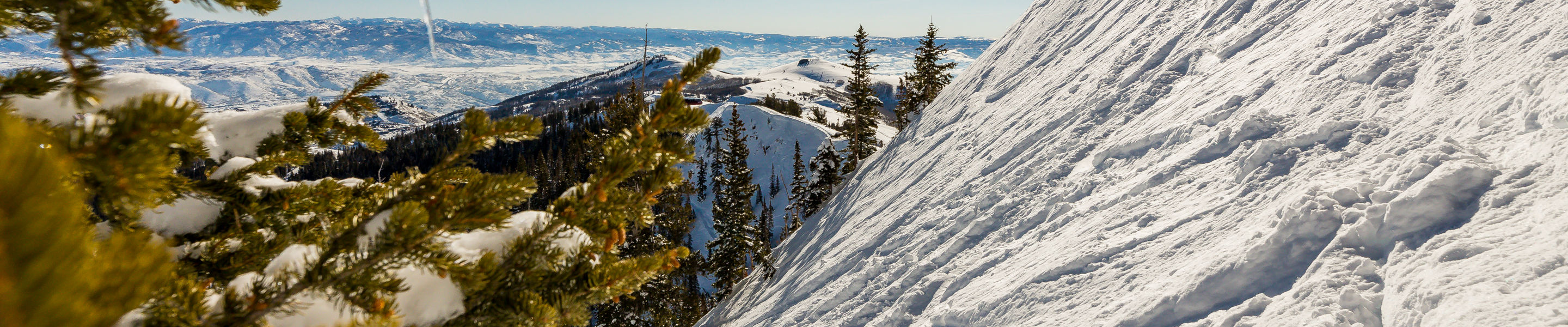 Skiers on top of vast terrain at Park City