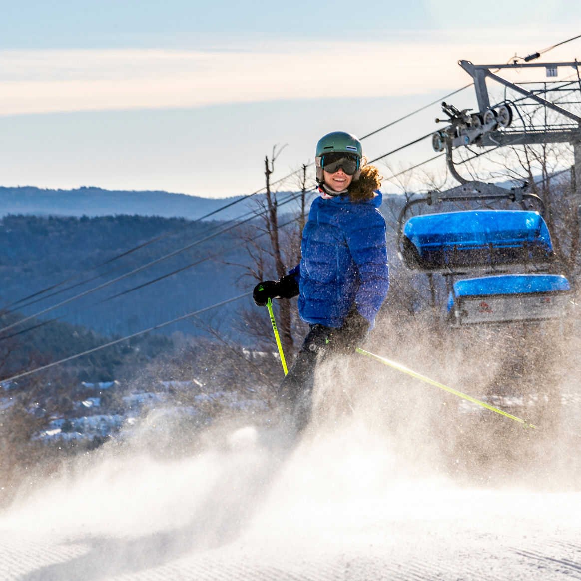 Woman Looks Uphill on Ski Run at Mount Snow