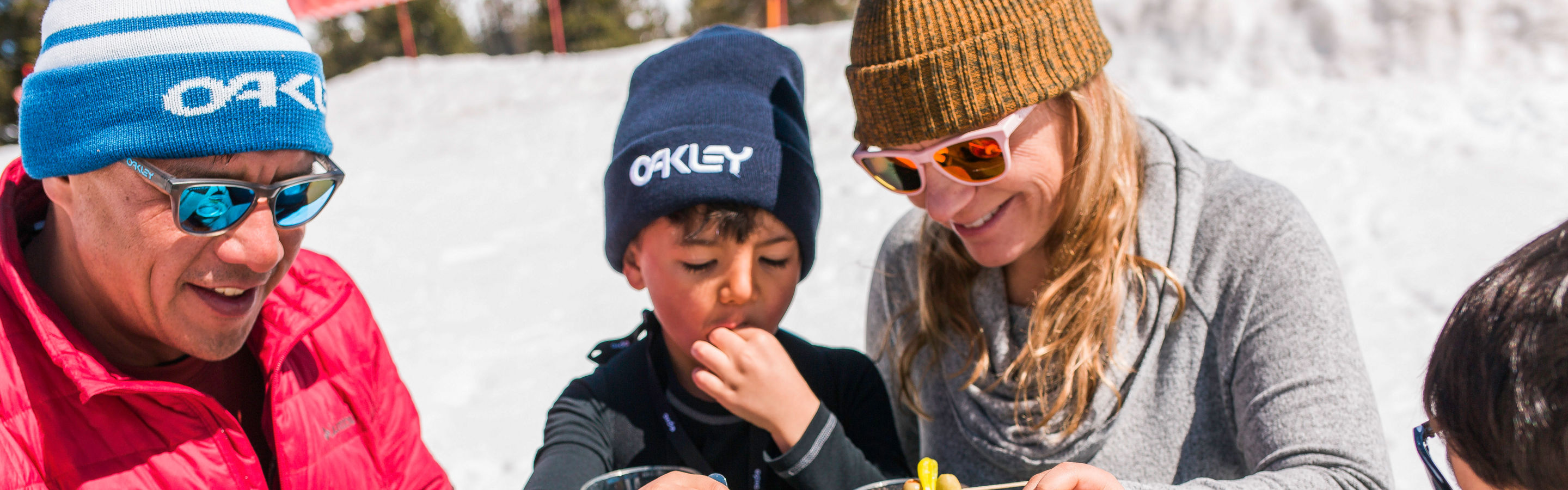 Family Enjoying Food and Drinks in the Sunshine in Kirkwood, CA.