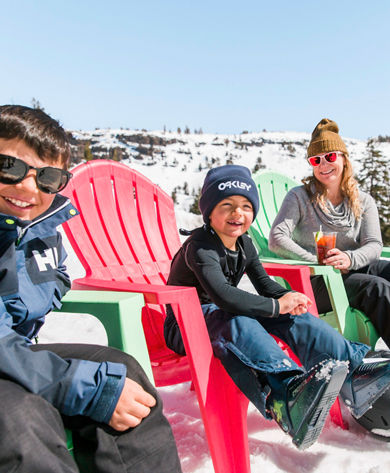 Family Enjoying Food and Drinks in the Sunshine in Kirkwood, CA.