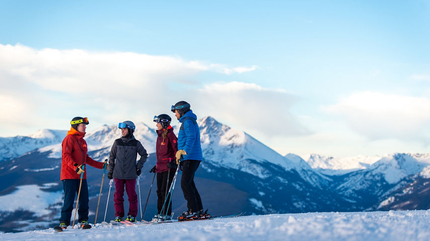 Friends enjoying scenic views in the Back Bowls of Vail, CO.