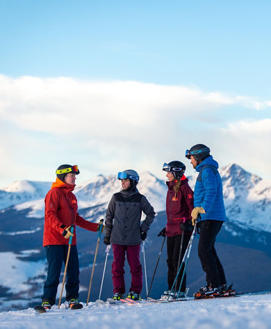 Friends enjoying scenic views in the Back Bowls of Vail, CO.