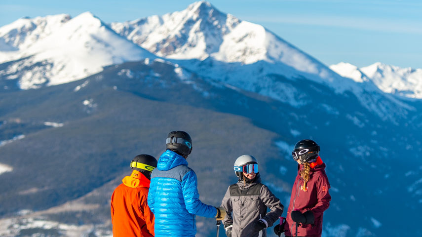 Friends enjoying scenic views in the Back Bowls of Vail, CO.