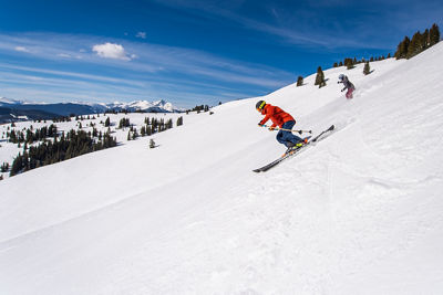 Skiing and Riding in the Back Bowls in Vail, CO.