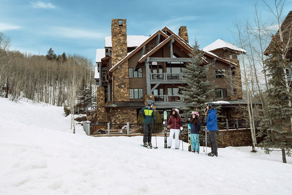 Family Leaving Their Ski-In Ski-Out Lodging at Bear Paw Lodge in Beaver Creek, CO