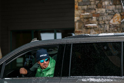 Family in GMC car in the snow in Kirkwood, CA.