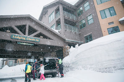 Family Checking Into Lodging at Kirkwood Resort
