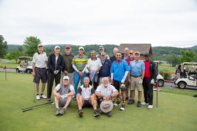 Group of Golfers Poses on Putting Green at Liberty Mountain Golf Club
