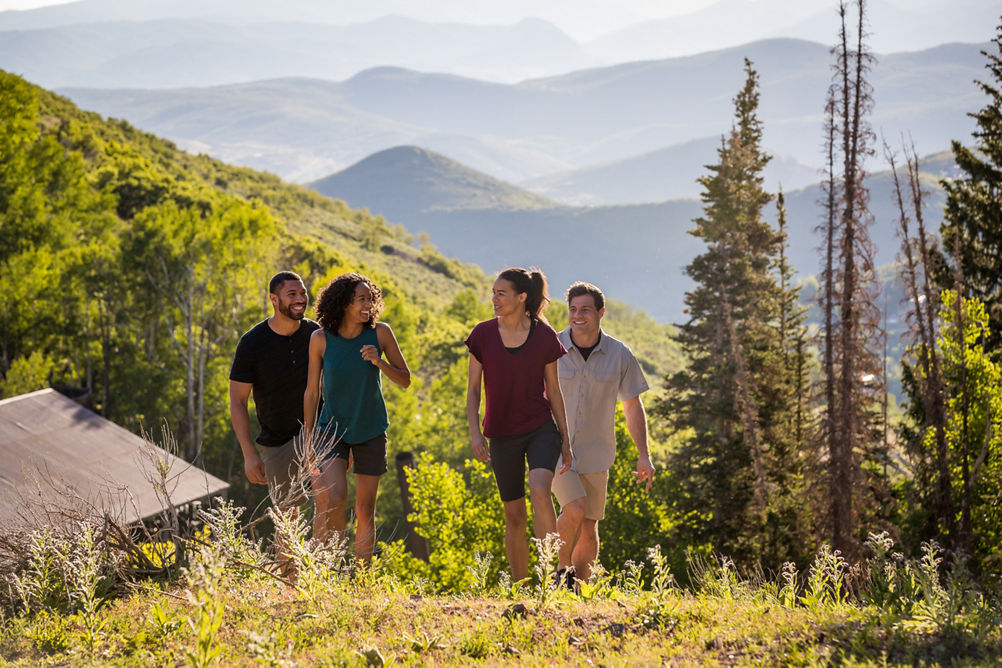 Friends hiking during summer at Park City