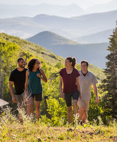 Friends hiking during summer at Park City