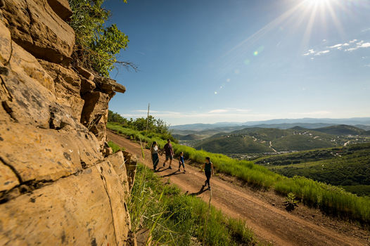 A family goes hiking during the summer at Park City
