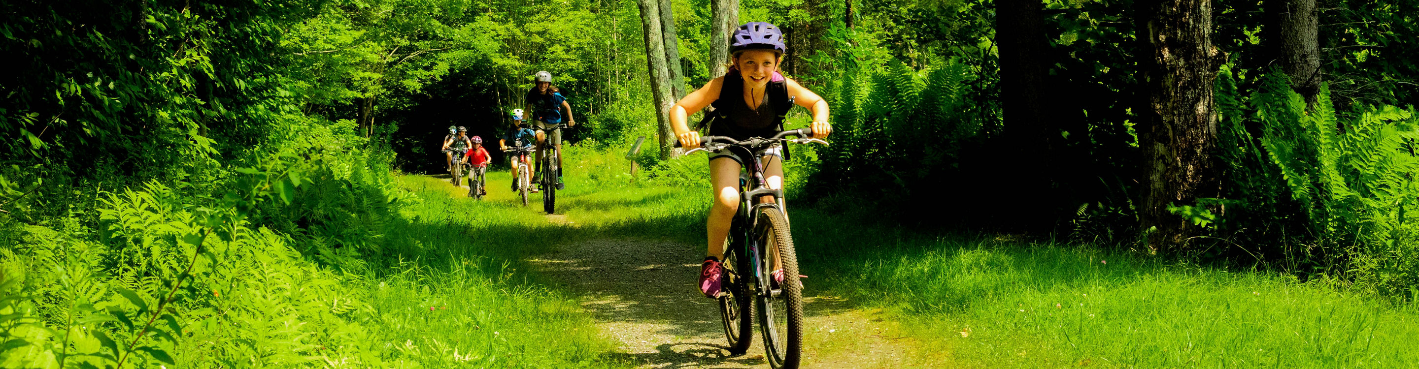 Kids Ride Mountain Bikes on Crosstown Trails Near Mount Snow
