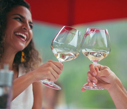 Couple Cheersing on the Deck of Beano's Cabin in Beaver Creek, CO