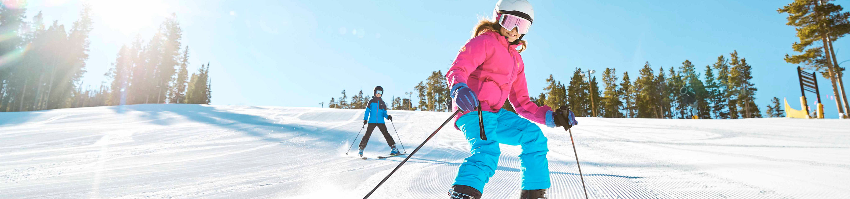 Family enjoys groomed run Schoolmarm at Keystone, CO.