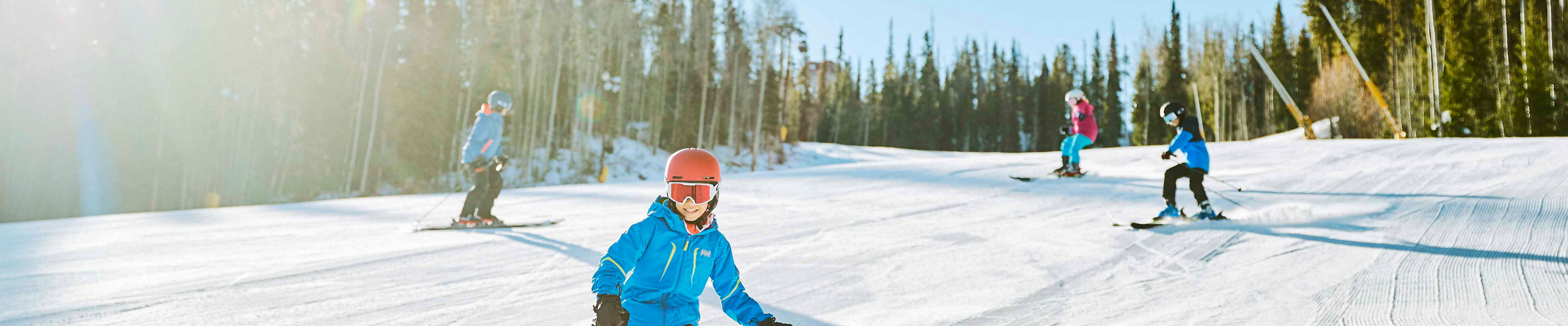 Family enjoys groomed run Schoolmarm at Keystone, CO.