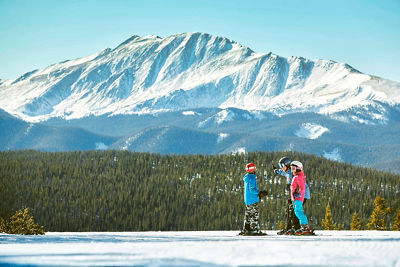 Family enjoys groomed run Schoolmarm at Keystone, CO.