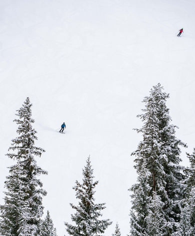 Grey skies with snow falling in Keystone, CO.