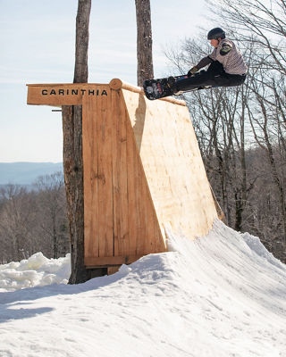 Snowboarder Hits Feature at Carinthia Terrain Park at Mount Snow