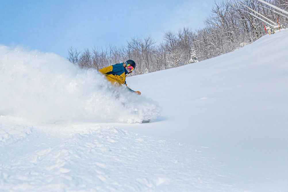 Snowboarder Hits Powder Stash at Hunter Mountain