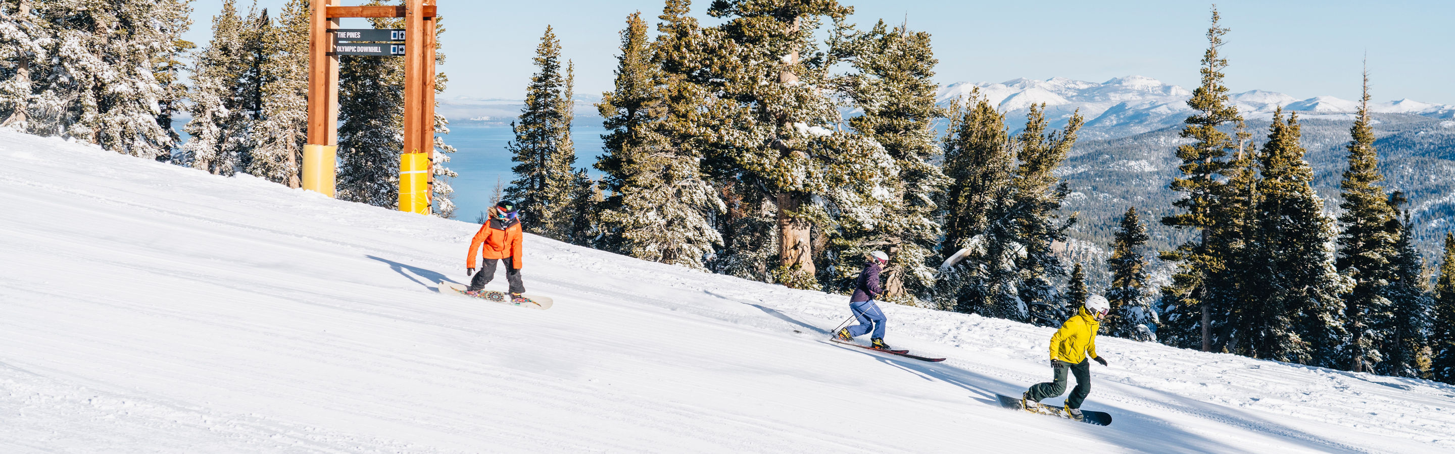 Friends Skiing and snowboarding at Olympic Express at Heavenly