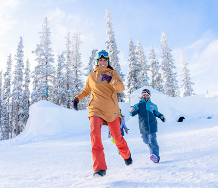 Family plays in the Kidtopia snow fort at Keystone, CO.