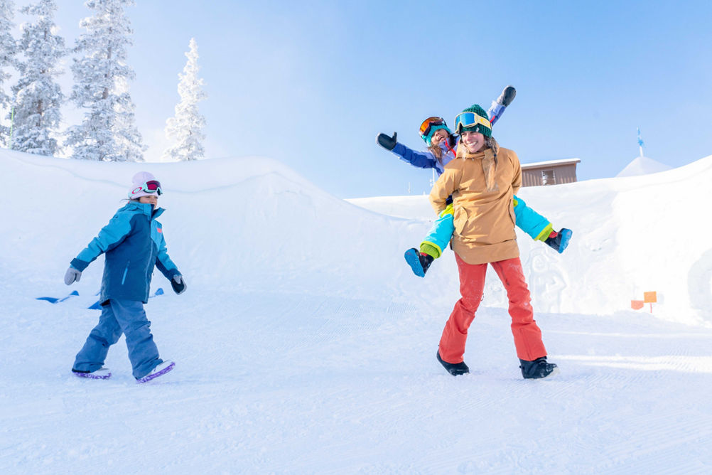 Family plays in the Kidtopia snow fort at Keystone, CO.