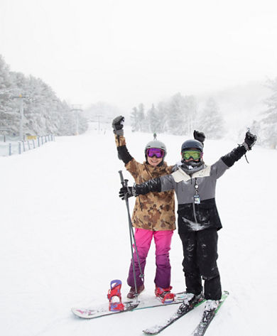 Skier and Rider Pose at Liberty Mountain