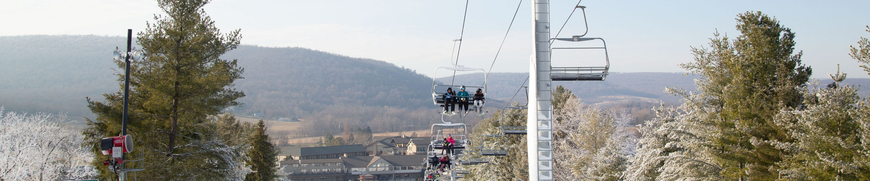 Dipsy Quad lift on sunny day at Liberty