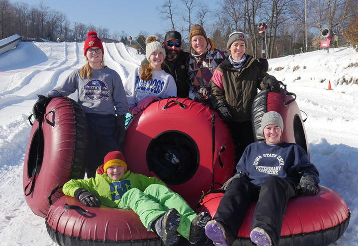 Family Poses on Tubing Hill at Roundtop