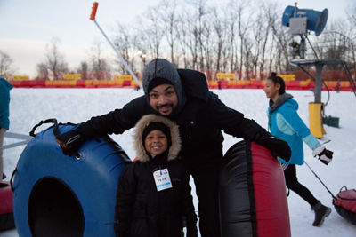 Father and Child Get Ready to Tube at liberty Mountain
