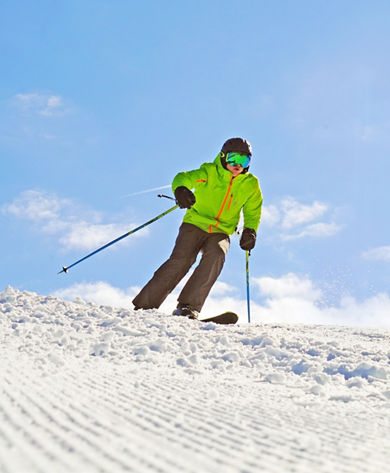 Skier Makes Turns Downhill at Mad River Mountain